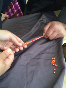 Teaching wrap bracelets in Marrakech